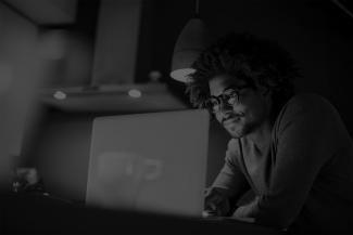 Man looking at a laptop