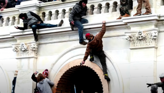 domestic terrorist storming the capitol in support of donald trump