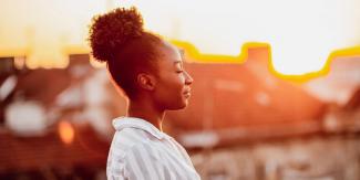 woman looking calm - educator health and well-being