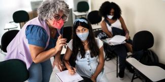 teacher and refugee student