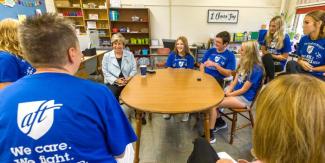 randi weingarten talking to kids in classroom